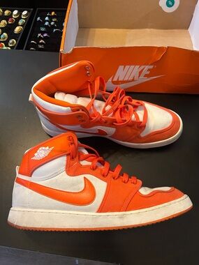 Nike Orange and White High-Top Sneakers with Swoosh